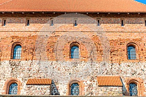 Brick castle wall with windows