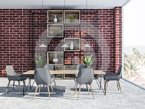 Brick dining room interior with cupboard