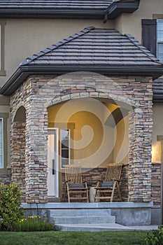 Brick entry by the front door of suburban home