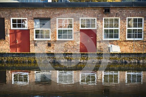 Brick facade by water