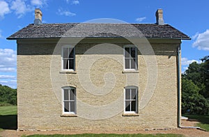 Brick Farmhouse, Four Windows, Two Chimneys, 1850s photo