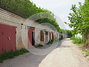 Brick garages with metal gates of a garage cooperative