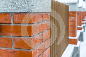 Brick gate pillars in row close up shot
