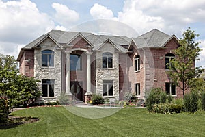 Brick home with white columns