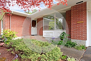 Brick house with entrance porch view