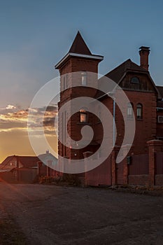 The brick house with a tower