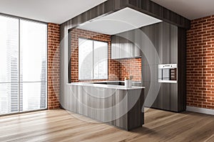 Brick kitchen corner with cupboards