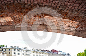 Brick laying under the Anichkov bridge, view from the river