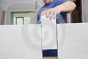 Brick-laying working hands