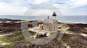 Brick lighthouse on a cloudy day on Block Island Rhode Island