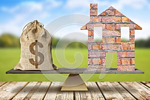 Brick nanufacturing business and real estate concept with dollar sign and home icon