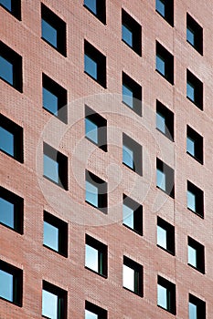 Brick office with many blue windows