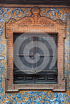 Brick ornament window and balcony spanish style with stucco decoration