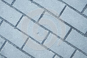 Brick pavement pattern of blocks rectangular shape made of stone