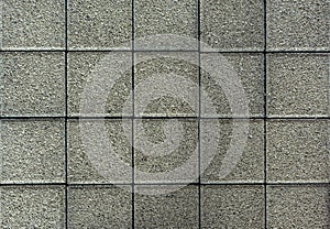 Brick pavement tile, top view. Urban texture as background. Stone pavement texture. Granite cobblestoned pavement background