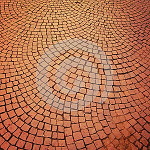 Brick pavement vintage effect. Bright roadway with arc motifs.