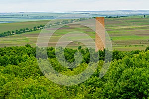 Brick pipe of a water tower. Background with selective focus and copy space