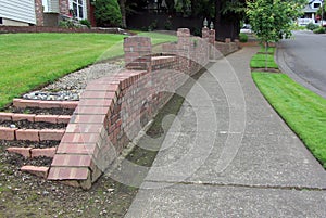 Brick retaining wall in neighborhood