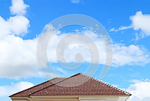 Brick roof with clear cloud blue sky