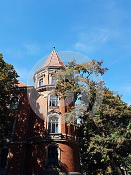 Brick round tower with a flugel, part of an old house