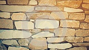 Brick stone wall stack of medieval natural stone texture background or rock strata boundary the rock seamless abstract and