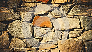 Brick stone wall stack of medieval natural stone texture background or rock strata boundary the rock seamless abstract and