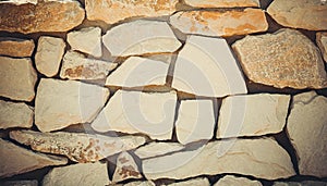 Brick stone wall stack of medieval natural stone texture background or rock strata boundary the rock seamless abstract and