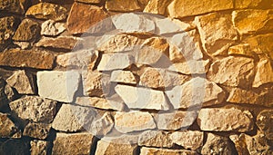 Brick stone wall stack of medieval natural stone texture background or rock strata boundary the rock seamless abstract and