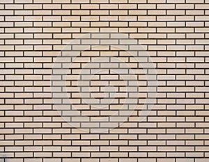 Brick texture. A fragment of the wall of the house
