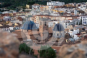 Brick tower and dome steeple of Iglesia de la Asuncion  church in Onda, Castellon, Spain photo