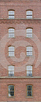 Brick wall with arch windows