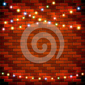 Brick wall background with colorful Christmas lights