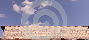 Brick Wall  background and roof sky blue