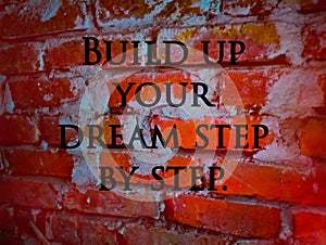 Brick wall background textured design with quoted build up your dream step by step photo