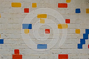 brick wall with coloured bricks
