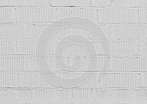 Brick wall covered with white light bright paint background texture