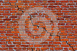 Brick wall with diagonal crack