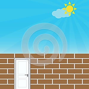 Brick wall with door, blue sky and sun, freedom concept