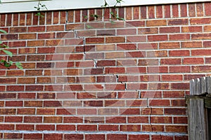 Crack in brick wall of a house