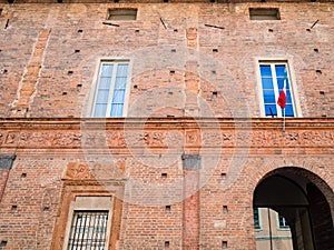 brick wall of imedieval house in Pavia city photo