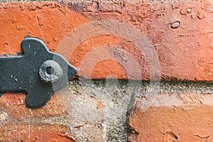 Brick wall iron fastener background texture