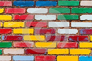Brick wall made of colored bricks