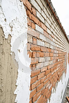 Brick Wall with Mixed Plaster
