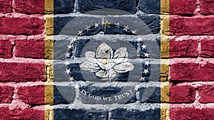 Brick wall with the new flag of the US state of Mississippi