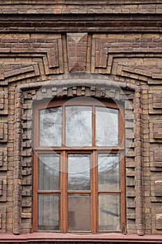 Brick wall of an old building. An ancient architectural structure made of brick