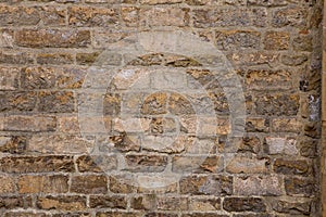 Brick wall of an old building. Masonry or brickwork of antique construct. Texture, background