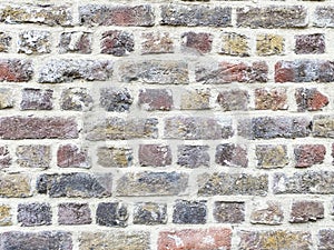 Brick wall with old grunge bricks, light colour