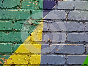 brick wall painted in different bright colors