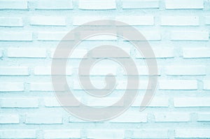 Brick wall painted with pale blue paint pastel calm tone texture background. Brickwork and stonework flooring interior rock old