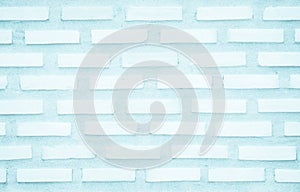 Brick wall painted with pale blue paint pastel calm tone texture background. Brickwork and stonework flooring interior rock old